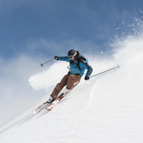 Austria, Arlberg, Man skiing downhill